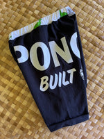 Load image into Gallery viewer, Kids Size 6 "Black &amp; Dinosaurs Pono Built" Beach Comber Shorts
