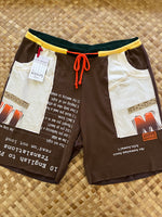 Load image into Gallery viewer, Mens Size L &quot;Brown &amp; Yellow Rise Up&quot; Kanikapila Shorts
