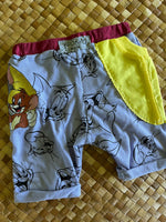 Load image into Gallery viewer, Kids Size 2 "Purple &amp; Yellow Tom and Jerry" Beach Comber Shorts
