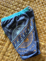 Load image into Gallery viewer, Kids Size 2 &quot;Blue &amp; Gold Surfing&quot; Beach Comber Shorts
